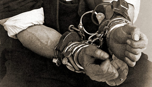 http://www.skeptic.com/eskeptic/06-10-31images/houdini-in-cuffs.jpg