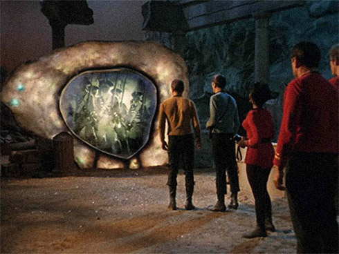 The crew of the USS Enterprise encounter the Guardian of Forever (Film still from episode. Credit: CBS)