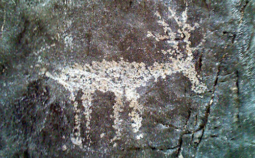 Petroglyphs in the slot canyon walls in Arrow Canyon, Nevada