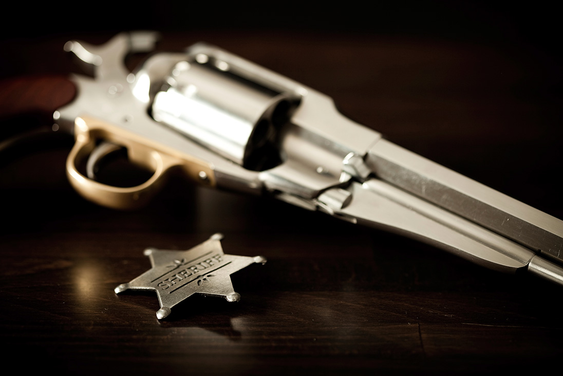 Free iStock photo from 2011 by Inkret [http://www.istockphoto.com/profile/inkret] (See: http://www.istockphoto.com/photo/old-west-sheriff-badge-10892293)