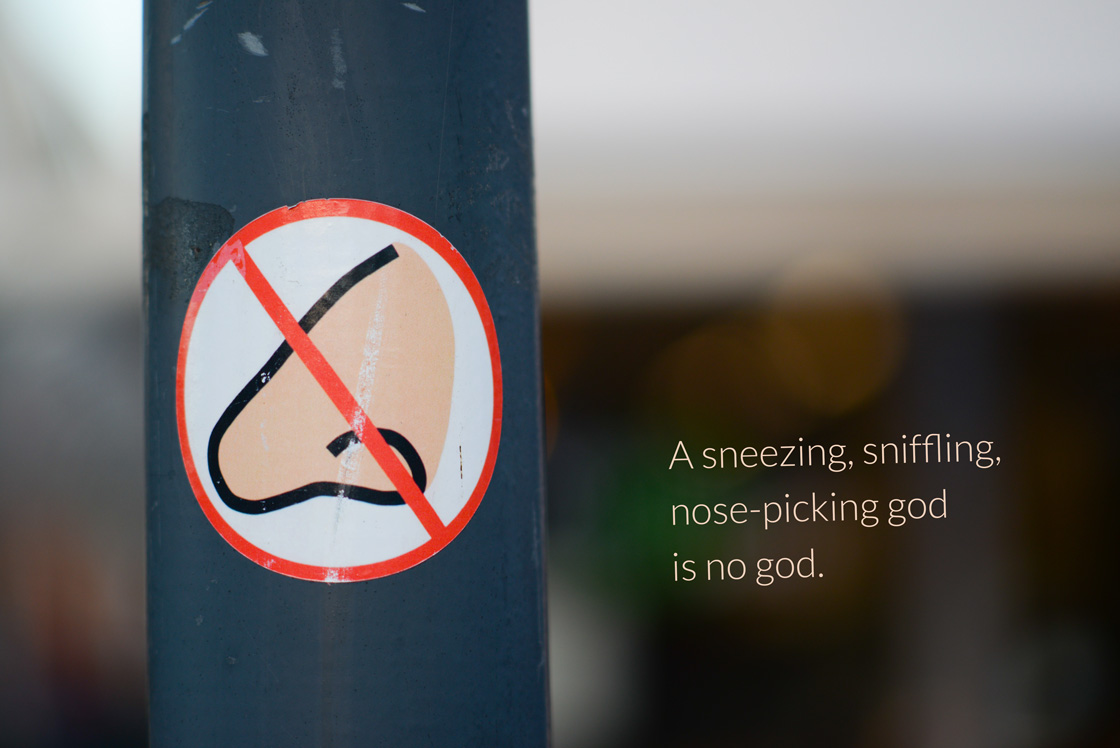 A sneezing, sniffling, nose-picking god is no god.