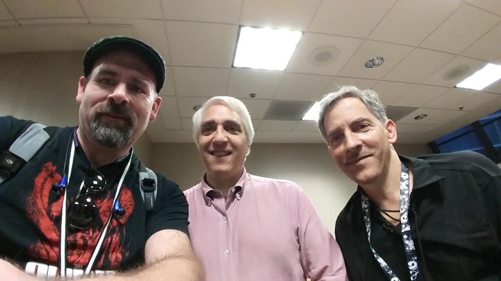 DragonCon photo with Blake, Dr. Steve Novella and Bob Novella of the <em>The Skeptics’ Guide to the Universe</em> podcast.